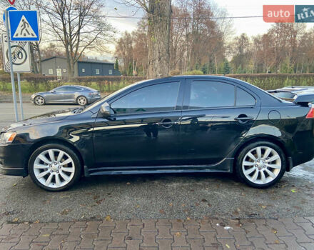 Чорний Міцубісі Lancer, об'ємом двигуна 2 л та пробігом 222 тис. км за 7500 $, фото 1 на Automoto.ua