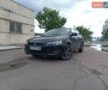 Черный Мицубиси Лансер, объемом двигателя 2 л и пробегом 280 тыс. км за 5700 $, фото 1 на Automoto.ua