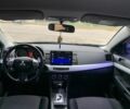 Черный Мицубиси Лансер, объемом двигателя 2 л и пробегом 180 тыс. км за 6100 $, фото 8 на Automoto.ua