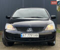 Чорний Міцубісі Lancer, об'ємом двигуна 1.58 л та пробігом 185 тис. км за 3750 $, фото 1 на Automoto.ua