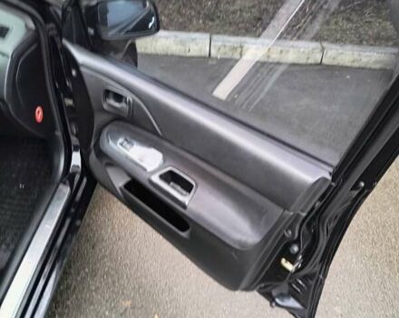 Черный Мицубиси Лансер, объемом двигателя 1.6 л и пробегом 309 тыс. км за 4000 $, фото 22 на Automoto.ua