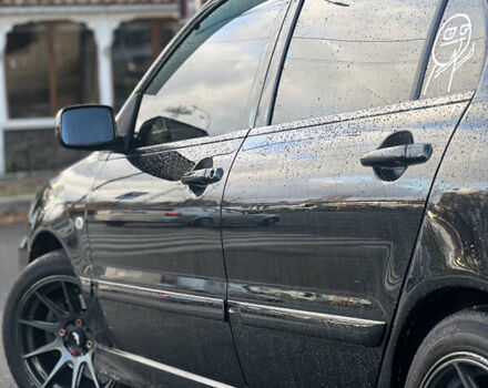 Черный Мицубиси Лансер, объемом двигателя 1.6 л и пробегом 211 тыс. км за 5700 $, фото 14 на Automoto.ua