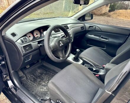 Чорний Міцубісі Lancer, об'ємом двигуна 1.6 л та пробігом 216 тис. км за 4990 $, фото 10 на Automoto.ua