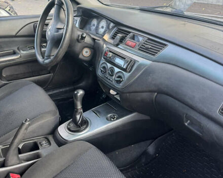 Чорний Міцубісі Lancer, об'ємом двигуна 1.58 л та пробігом 243 тис. км за 3800 $, фото 7 на Automoto.ua