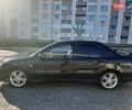 Черный Мицубиси Лансер, объемом двигателя 2 л и пробегом 272 тыс. км за 5000 $, фото 1 на Automoto.ua