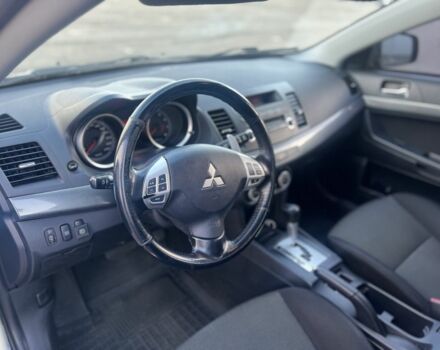 Черный Мицубиси Лансер, объемом двигателя 2 л и пробегом 170 тыс. км за 7900 $, фото 11 на Automoto.ua