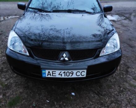 Чорний Міцубісі Lancer, об'ємом двигуна 1.6 л та пробігом 259 тис. км за 4500 $, фото 7 на Automoto.ua