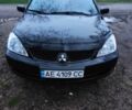 Чорний Міцубісі Lancer, об'ємом двигуна 1.6 л та пробігом 259 тис. км за 4500 $, фото 7 на Automoto.ua