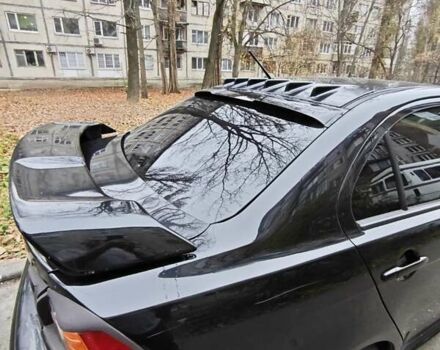 Чорний Міцубісі Lancer, об'ємом двигуна 2 л та пробігом 68 тис. км за 5500 $, фото 5 на Automoto.ua