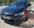 Чорний Міцубісі Lancer, об'ємом двигуна 2 л та пробігом 199 тис. км за 6500 $, фото 1 на Automoto.ua