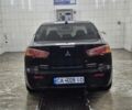 Чорний Міцубісі Lancer, об'ємом двигуна 1.5 л та пробігом 170 тис. км за 5811 $, фото 1 на Automoto.ua