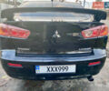 Чорний Міцубісі Lancer, об'ємом двигуна 2 л та пробігом 222 тис. км за 7500 $, фото 3 на Automoto.ua