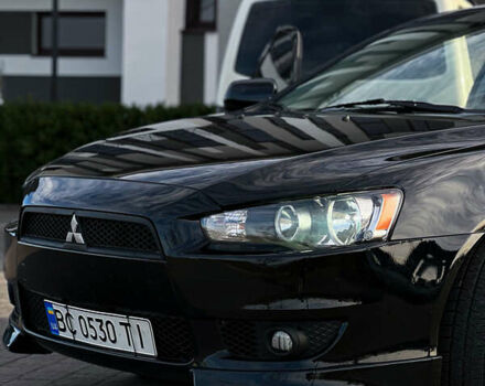 Черный Мицубиси Лансер, объемом двигателя 2 л и пробегом 333 тыс. км за 7300 $, фото 11 на Automoto.ua