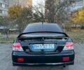 Черный Мицубиси Лансер, объемом двигателя 2 л и пробегом 280 тыс. км за 5400 $, фото 4 на Automoto.ua