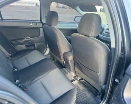 Черный Мицубиси Лансер, объемом двигателя 2 л и пробегом 170 тыс. км за 7900 $, фото 16 на Automoto.ua