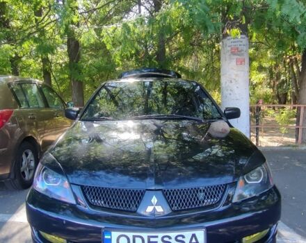 Чорний Міцубісі Lancer, об'ємом двигуна 1.6 л та пробігом 221 тис. км за 4600 $, фото 9 на Automoto.ua