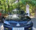 Чорний Міцубісі Lancer, об'ємом двигуна 1.6 л та пробігом 221 тис. км за 4600 $, фото 9 на Automoto.ua