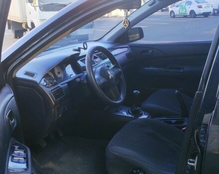Чорний Міцубісі Lancer, об'ємом двигуна 1.6 л та пробігом 221 тис. км за 4600 $, фото 3 на Automoto.ua