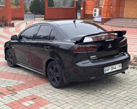 Черный Мицубиси Лансер, объемом двигателя 2 л и пробегом 217 тыс. км за 5500 $, фото 5 на Automoto.ua