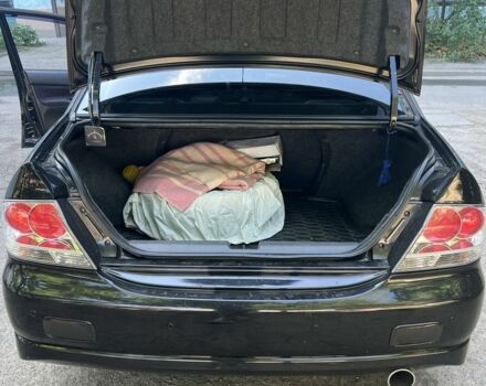 Черный Мицубиси Лансер, объемом двигателя 2 л и пробегом 240 тыс. км за 5600 $, фото 8 на Automoto.ua