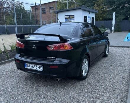 Чорний Міцубісі Lancer, об'ємом двигуна 2 л та пробігом 300 тис. км за 6185 $, фото 4 на Automoto.ua