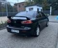 Чорний Міцубісі Lancer, об'ємом двигуна 2 л та пробігом 300 тис. км за 6185 $, фото 4 на Automoto.ua