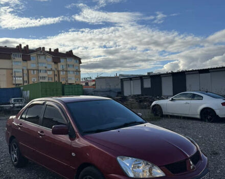 Чорний Міцубісі Lancer, об'ємом двигуна 1.6 л та пробігом 195 тис. км за 5000 $, фото 10 на Automoto.ua