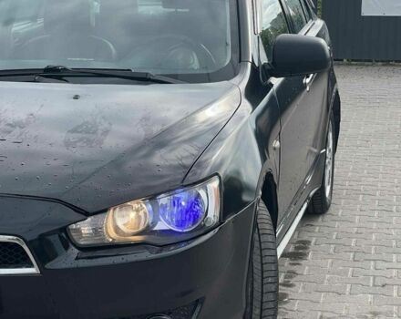 Черный Мицубиси Лансер, объемом двигателя 2 л и пробегом 350 тыс. км за 4299 $, фото 7 на Automoto.ua