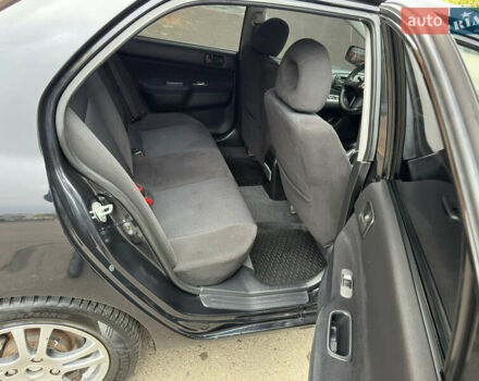 Чорний Міцубісі Lancer, об'ємом двигуна 1.58 л та пробігом 173 тис. км за 4700 $, фото 17 на Automoto.ua