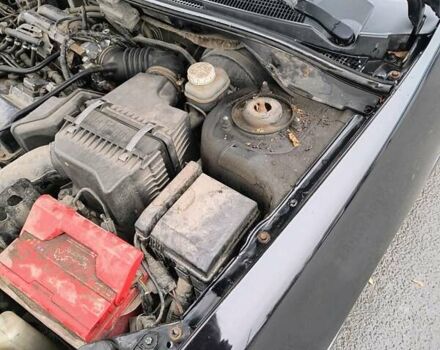 Черный Мицубиси Лансер, объемом двигателя 1.6 л и пробегом 309 тыс. км за 4000 $, фото 12 на Automoto.ua