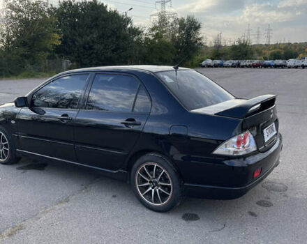 Чорний Міцубісі Lancer, об'ємом двигуна 2 л та пробігом 280 тис. км за 4600 $, фото 18 на Automoto.ua