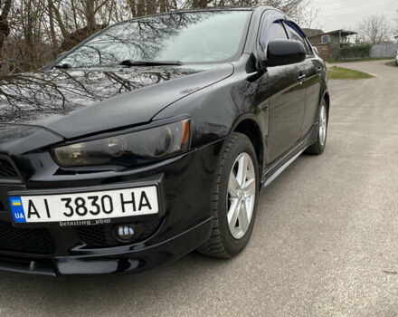 Черный Мицубиси Лансер, объемом двигателя 2 л и пробегом 164 тыс. км за 8300 $, фото 6 на Automoto.ua