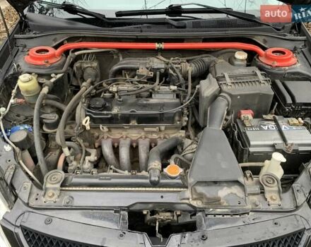 Черный Мицубиси Лансер, объемом двигателя 1.6 л и пробегом 164 тыс. км за 5200 $, фото 15 на Automoto.ua