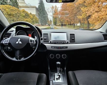 Черный Мицубиси Лансер, объемом двигателя 2 л и пробегом 115 тыс. км за 5000 $, фото 17 на Automoto.ua