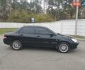 Чорний Міцубісі Lancer, об'ємом двигуна 1.58 л та пробігом 190 тис. км за 3750 $, фото 8 на Automoto.ua