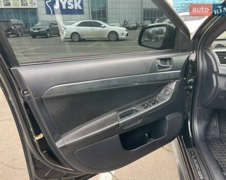 Черный Мицубиси Лансер, объемом двигателя 2 л и пробегом 246 тыс. км за 7500 $, фото 15 на Automoto.ua