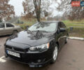 Чорний Міцубісі Lancer, об'ємом двигуна 2 л та пробігом 281 тис. км за 6000 $, фото 1 на Automoto.ua