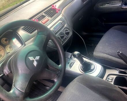 Чорний Міцубісі Lancer, об'ємом двигуна 1.6 л та пробігом 320 тис. км за 2500 $, фото 2 на Automoto.ua