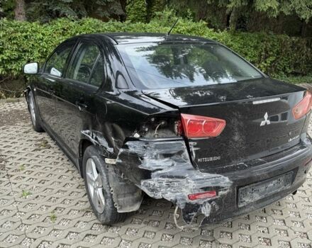 Чорний Міцубісі Lancer, об'ємом двигуна 2 л та пробігом 245 тис. км за 3500 $, фото 4 на Automoto.ua
