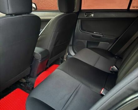 Черный Мицубиси Лансер, объемом двигателя 2 л и пробегом 247 тыс. км за 4700 $, фото 7 на Automoto.ua