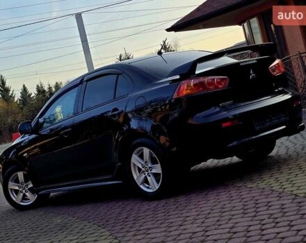 Чорний Міцубісі Lancer, об'ємом двигуна 2 л та пробігом 260 тис. км за 6555 $, фото 2 на Automoto.ua