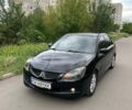 Чорний Міцубісі Lancer, об'ємом двигуна 2 л та пробігом 258 тис. км за 5200 $, фото 2 на Automoto.ua