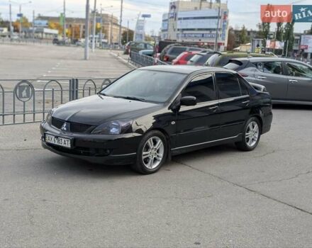 Чорний Міцубісі Lancer, об'ємом двигуна 2 л та пробігом 152 тис. км за 5500 $, фото 29 на Automoto.ua