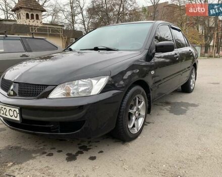 Черный Мицубиси Лансер, объемом двигателя 1.6 л и пробегом 164 тыс. км за 5200 $, фото 4 на Automoto.ua