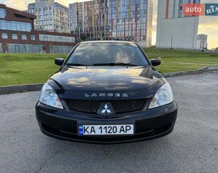 Черный Мицубиси Лансер, объемом двигателя 1.58 л и пробегом 237 тыс. км за 3999 $, фото 7 на Automoto.ua