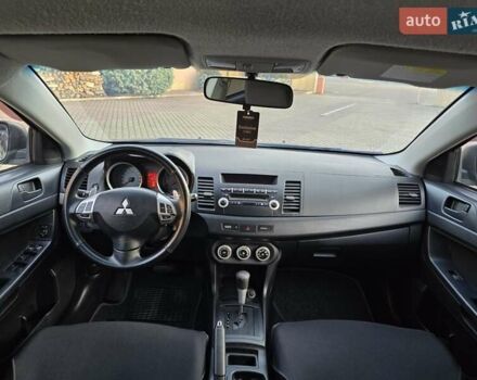 Чорний Міцубісі Lancer, об'ємом двигуна 2 л та пробігом 260 тис. км за 6555 $, фото 31 на Automoto.ua