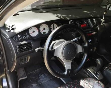 Мицубиси Лансер 2007 в Краматорске на Automoto.ua Черный Мицубиси Лансер, объемом двигателя 2 л и пробегом 193 тыс. км за 6250 $, фото 3 на Automoto.ua