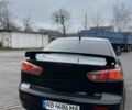 Черный Мицубиси Лансер, объемом двигателя 2 л и пробегом 350 тыс. км за 6700 $, фото 3 на Automoto.ua