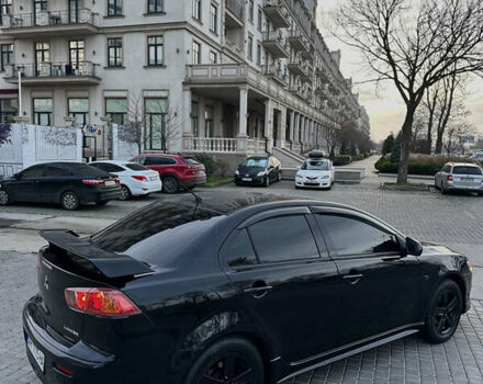 Черный Мицубиси Лансер, объемом двигателя 2 л и пробегом 245 тыс. км за 6200 $, фото 7 на Automoto.ua