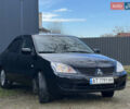 Чорний Міцубісі Lancer, об'ємом двигуна 1.58 л та пробігом 185 тис. км за 3750 $, фото 2 на Automoto.ua